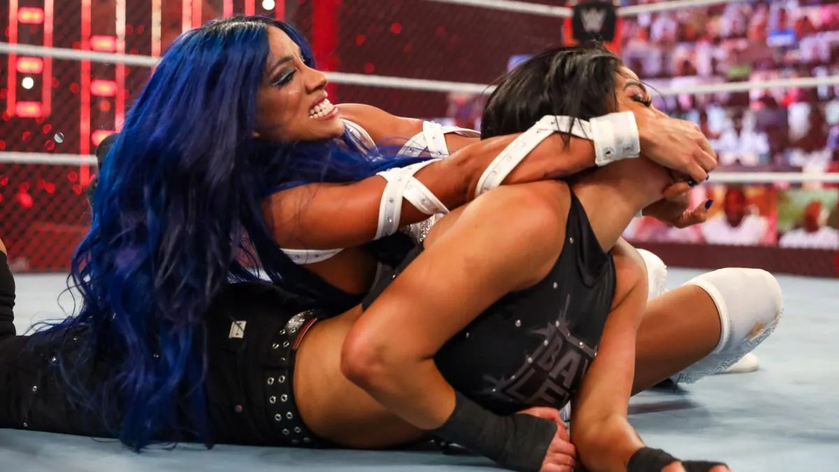 A wrestler locks in the Banks Statement submission hold